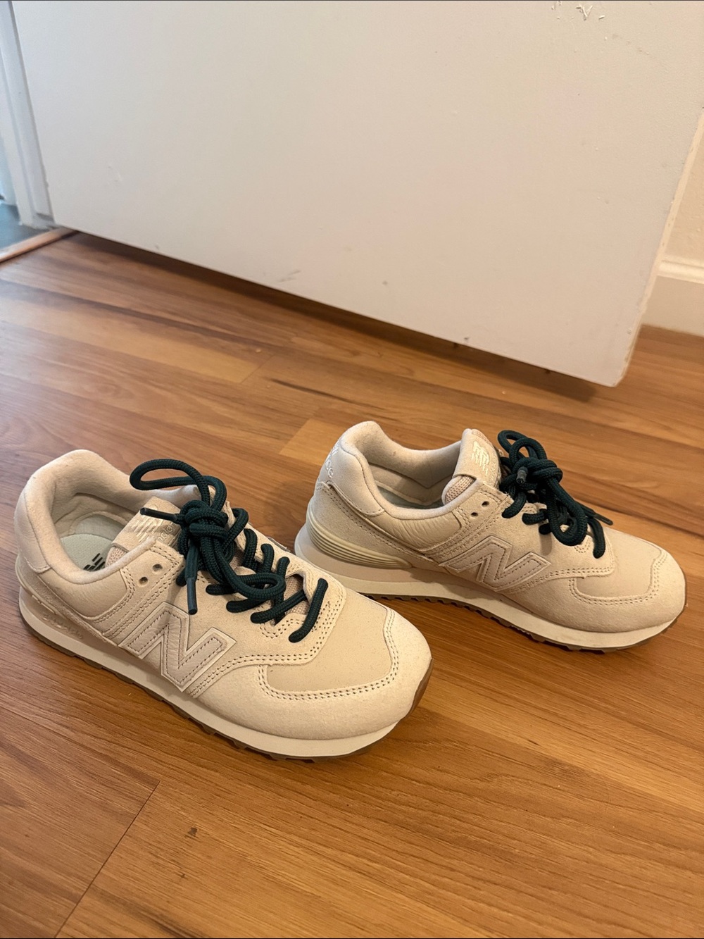 New Balance women’s Beige Sneakers with Dark Green Laces